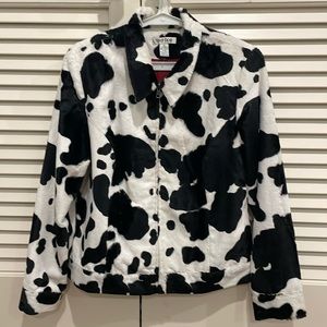 Tyler Boe black and white spotted jacket with zipper and red lining.